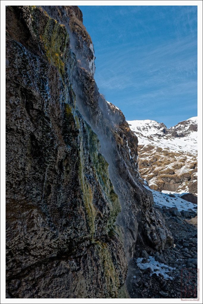 You can see steaming hot water emerging from the mountainside, and the colorful green slime that grown in the scalding hot water. 