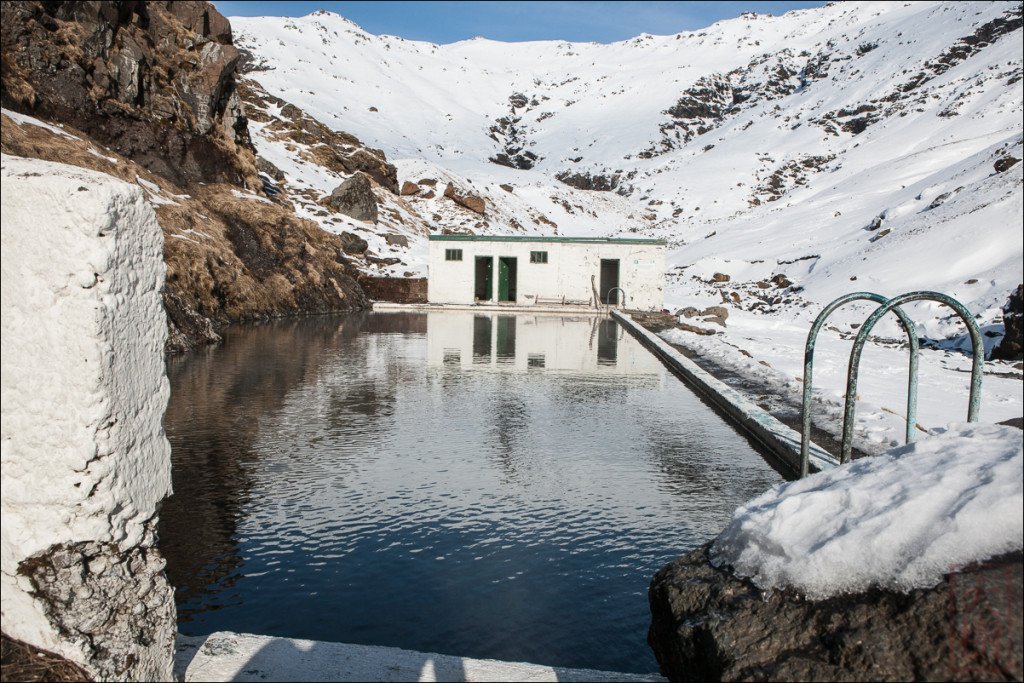 Nice thermal-fed pool built in the 1920's. I gave a couple of hitchhiking  students from Reykjavik a ride here, and they told me that when Eyjafjallajökull erupted, this pool was filled with volcanic ash, and it was dug out (by hand?) in order to restore it to use.